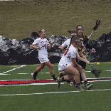 Women's lacrosse team playing a great game