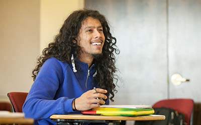 Bryn Athyn College student in class smiling